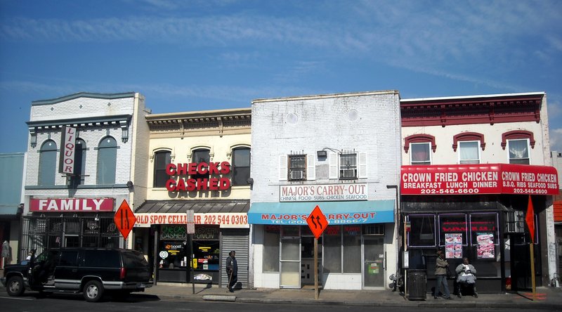 Shops and parked cars along H Street NE in Washington, D.C.