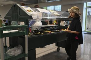 Students use a salad bar at DC Bilingual Public Charter School