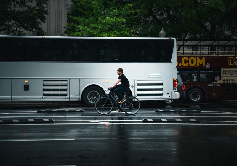 A cyclist rides along a Washington, D.C., street; representative photograph, not the collision scene