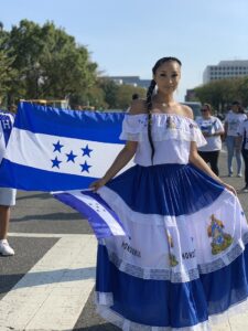Participants carrying flags during the 2019 Fiesta DC parade in Washington
