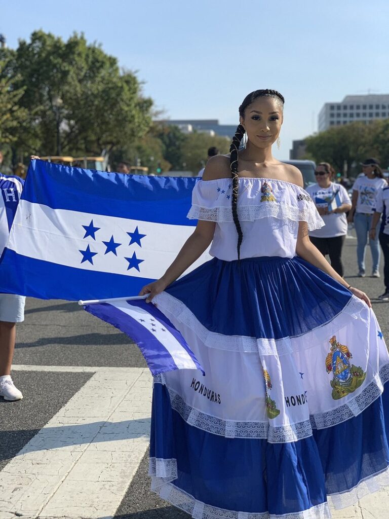 Participants carrying flags during the 2019 Fiesta DC parade in Washington