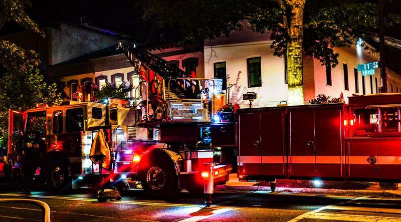 Emergency vehicle on U Street in Washington's Shaw neighborhood at night