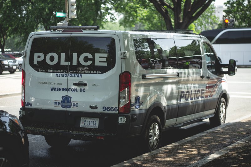 A Metropolitan Police Department transport van parked on a street in Washington, D.C.