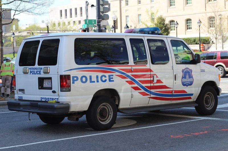 A Metropolitan Police Department transport van parked on a street in Washington, D.C.