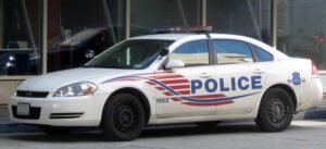 A Washington, D.C. Metropolitan Police Department Chevrolet Impala cruiser parked on a city street.