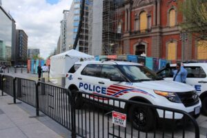 Marked Metropolitan Police Department Ford Police Interceptor Utility cruiser parked on a city street in Washington, D.C.