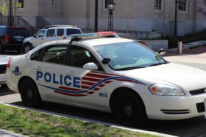 A Washington, D.C. Metropolitan Police Department Chevrolet Impala patrol cruiser parked on a city street.