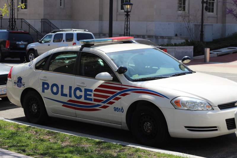 A Washington, D.C. Metropolitan Police Department Chevrolet Impala patrol cruiser parked on a city street.